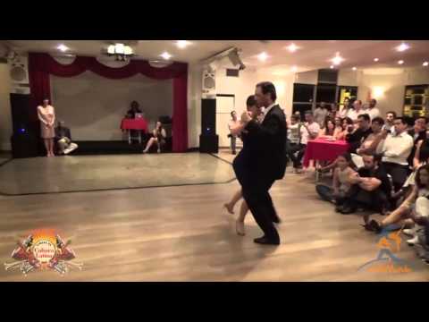  Juliana Maggioli  and  Enrique de Fazio  are  dancing  to  the  tango  "  Flor de Tango  "  by  Osvaldo Pugliese  in  2015