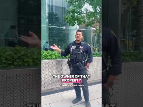 I'm Taking Pictures Of A Glass Building, Not Your Secrets!