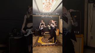 Singer gets WAY TOO into performing and this happens…😳 #band #rock #rockmusic #rockband #music #tx2