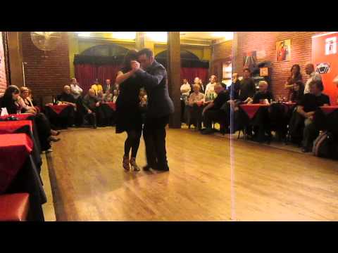  Cristian Sepúlveda  and  Maria Edith Bernatene  are  dancing  to  a  milonga