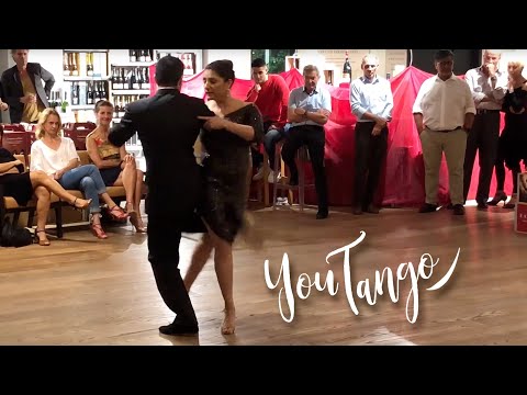  Miriam Copello  and  Cristian Dario Correa  are  dancing  to  the  tango  "  Pensalo Bien  "  by  Juan D'Arienzo  in  2019