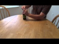 How to Open a Beer Bottle Using a Penny and a Dime