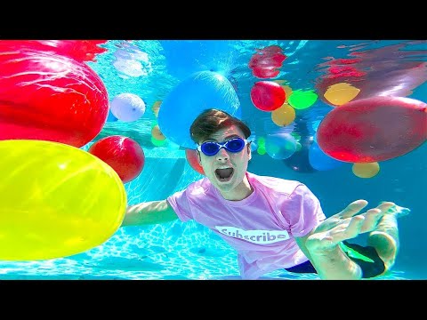 SWIMMING WITH GIANT WATER BALLOONS!! (UNDERWATER)