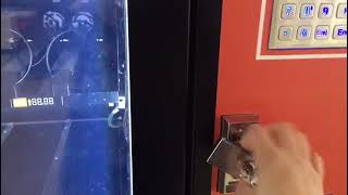 how to open the vending machine door