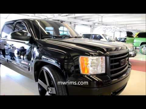GMC sierra on 30" DUB ballers stuntfest 2015