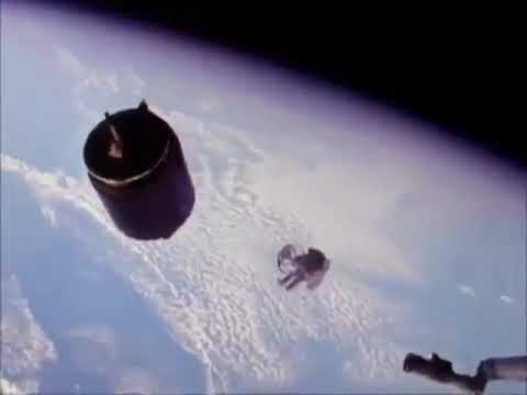 Astronaut Dale Gardner retrieves Westar-6 Satellite during NASA's Space Shuttle program