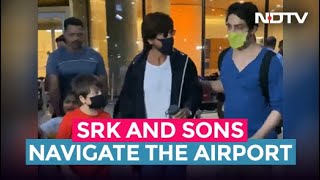 Shah Rukh Khan Navigates Mumbai Airport With Sons 