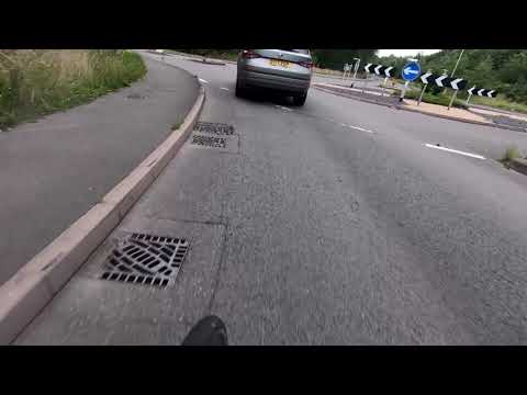 DT17ZGP MGIF at a mini roundabout