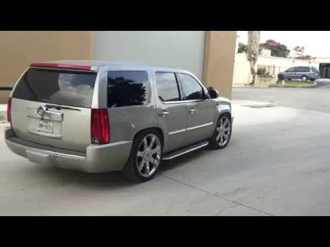 Escalade with roof-rack removed, wilwood brakes and drop kit