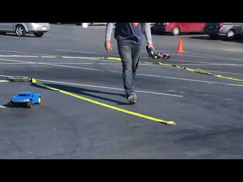 Traxxas Slash 2wd LCG vs HCG lean comparison about a track