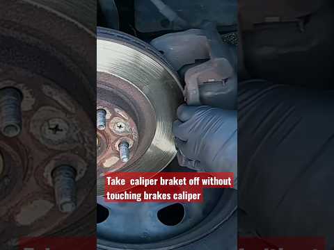 Tricks to remove a caliper bracket without touching brakes pads an caliper.