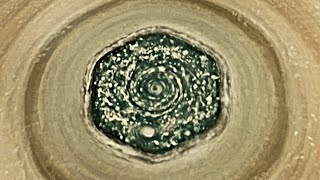 Saturn's unique hexagonal storm in motion in Cassini spacecraft's data