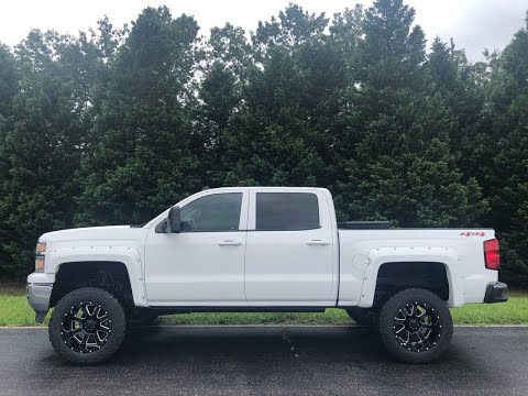 2014 Chevy Silverado lifted 6" on 20x12 Big Blocks at Dlux Motorsports
