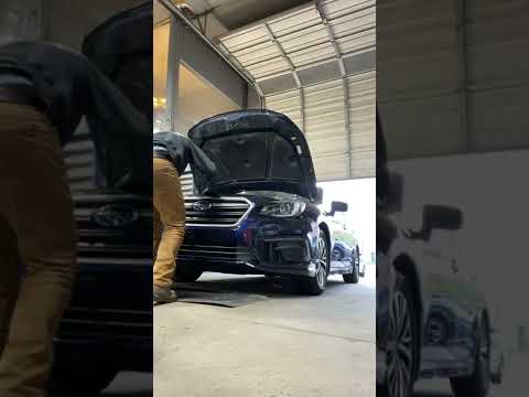 Subaru Legacy front cover assembly
