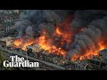 'It's all over': huge fire rips through Dhaka clothing market