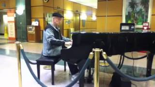 T.c. Wells plays piano at Ochsner