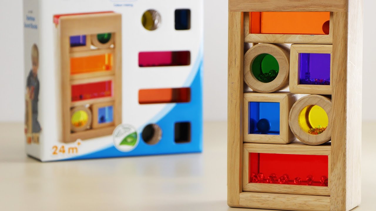 Wonderworld Dřevěné chrastící duhové kostky