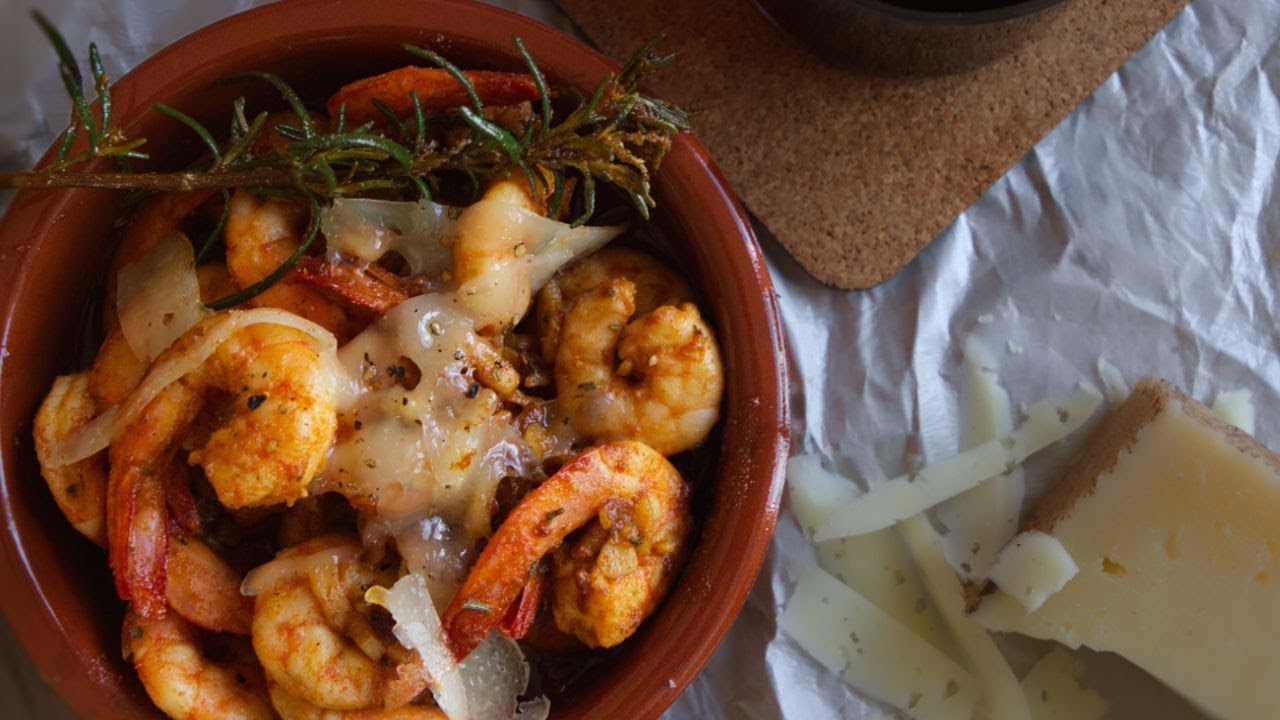 a tapas serving of spanish garlic shrimp with Manchego
