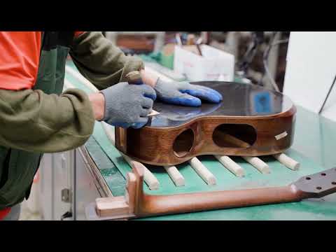 Inside the Making of Cort's Modern Black Acoustic Guitar
