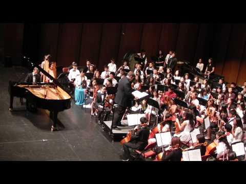 Dimitri (13) plays Gershwin's Rhapsody in Blue with the FA Middle School Symphony Orchestra