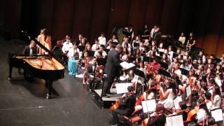 Dimitri (13) plays Gershwin's Rhapsody in Blue with the FA Middle School Symphony Orchestra