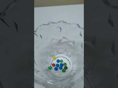 mini m&m chocolate #satisfying #shortII Cecil Sanchez