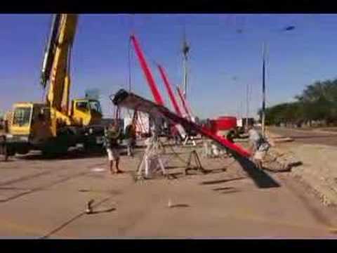 Placing the Mast on the Spirit of Canada