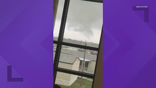 Videos show possible tornado outside high school in Spring