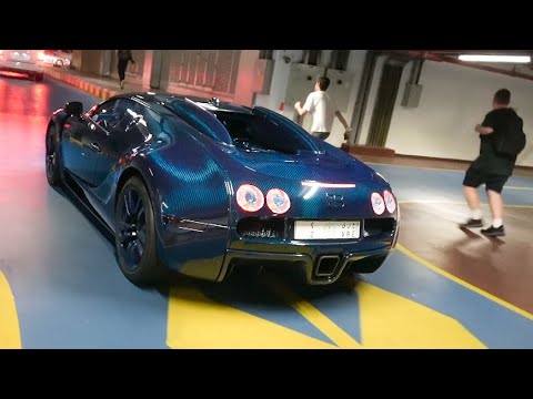 Mansory Bugatti Veyron EMPIRE Edition driving in Dubai! Full blue carbon - Start up & Engine sounds
