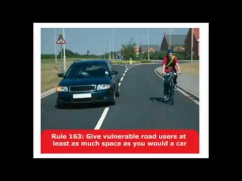 hv13oza MGIf pass past parked car.