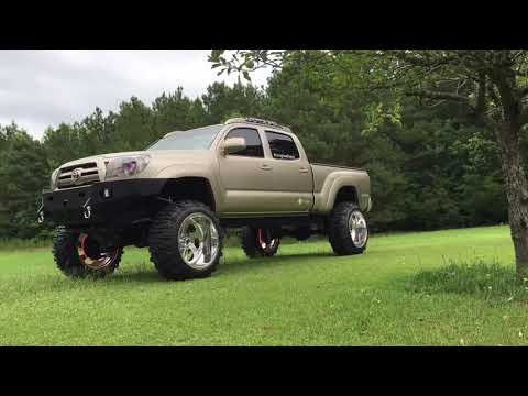 Toyota Tacoma 22x14 Fuel Forged Super Swamper Boggers Custom Headlights Wheel Lights