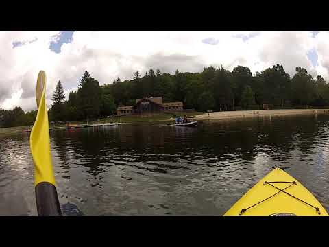 Video of the main building with boat rentals and the swimming beach from the water