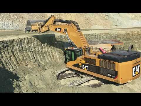 Caterpillar 385C Excavator Loading Caterpillar Dumpers And Trucks - Kivos Ate