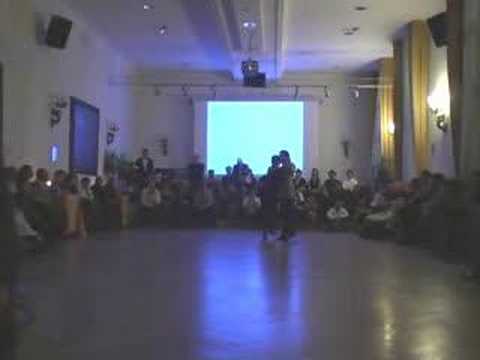  Ezequiel Paludi  and  Geraldine Paludi  are  dancing  to  the  tango  "  A Las 7 En El Cafe  "