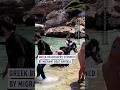 Greek beachgoers stunned by migrant boat arrival