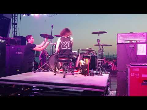 Dan Todd and Natalie Belmont capture their friend 'Zoltan Chaney' with 'Vince Neil'