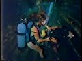 Man And Woman Scuba Diving Inside Shipwreck Scene From Tv Show 1980s