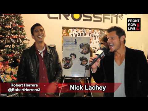 Nick Lachey of 98 Degrees sings "I Do" with Robert Herrera