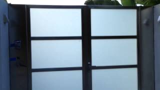 Stainless gate with glass. Work done by Avi Ben David at mu