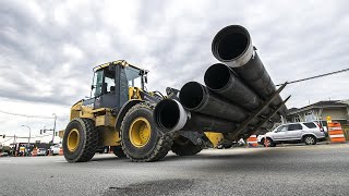 Complete Utility Contractors installs a new watermain along the future SkyTrain extension corridor
