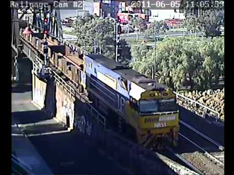 NR51 shunts a rake of steel wagons into Bunbury Street on 5-6-2011