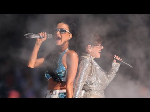 Tina Arena joins Katy Perry on stage at the AFL Grand Final.