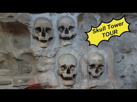 Skull Tower - stone structure embedded with human skull