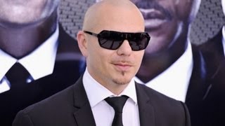 Pitbull defends Jay-Z in his own rap.