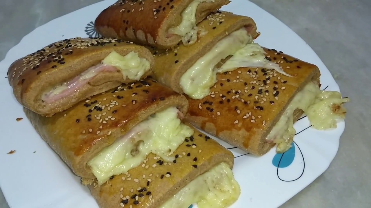 SALGADO JUELHO DE QUEIJO E PRESUNTO COM MASSA 100 % INTEGRAL