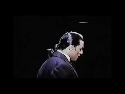 Ensemble tableau in foggy London during the number 'Façade'