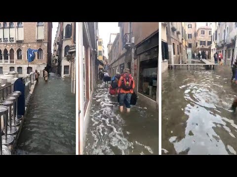 Marathon Runners Race Through Flooded Venice