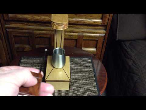 Remote control coin dropper custom built by Frank Paris