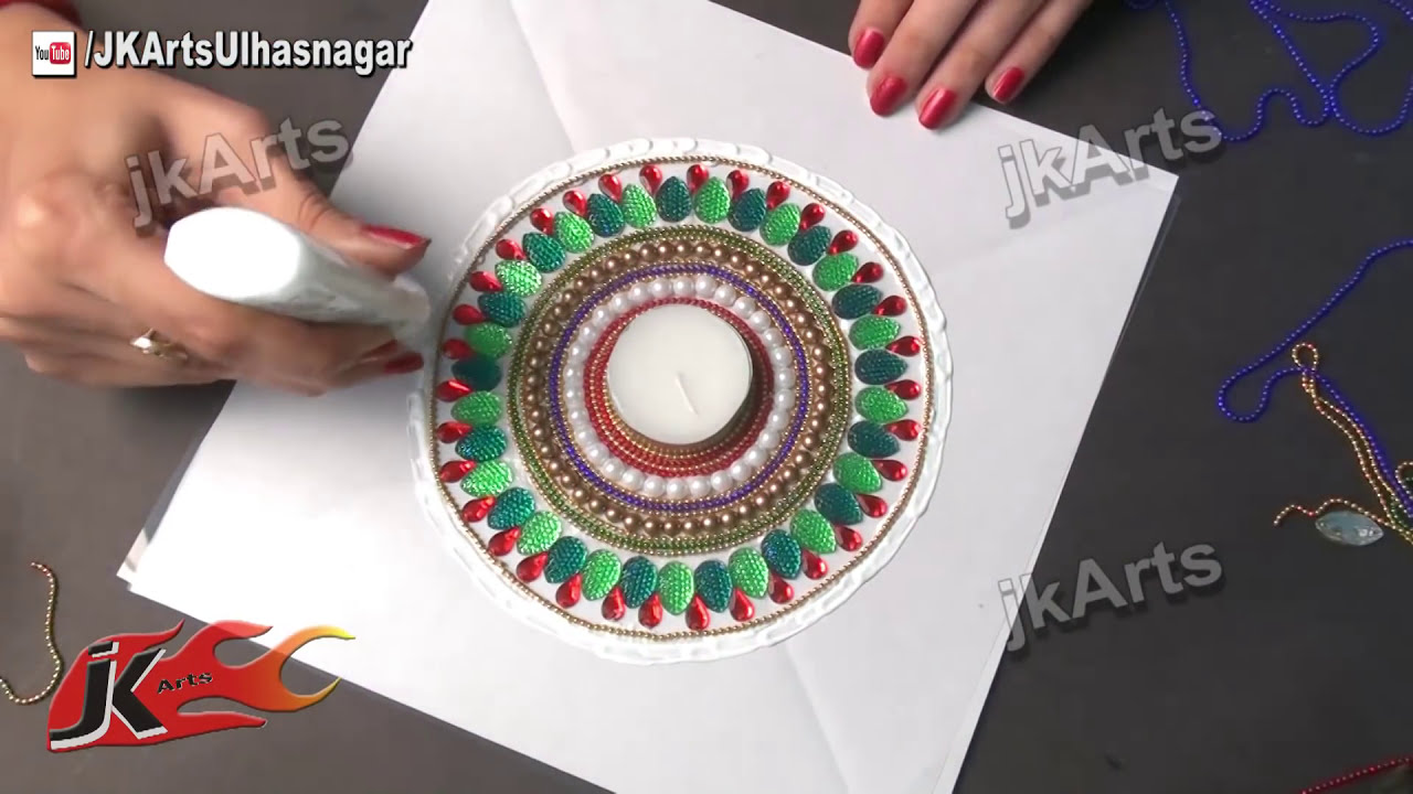 beautiful rearrangeble kundan rangoli design by jk arts