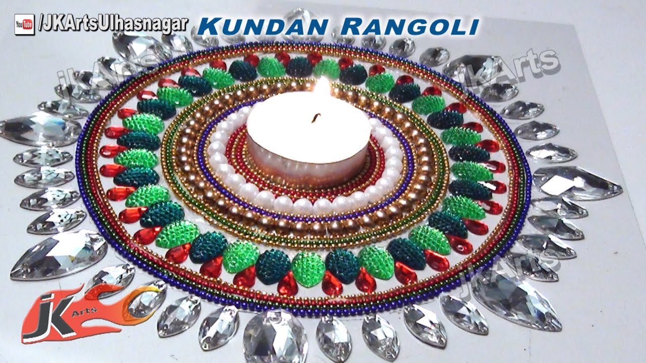 Beautiful rearrangeble kundan rangoli design by JK Arts